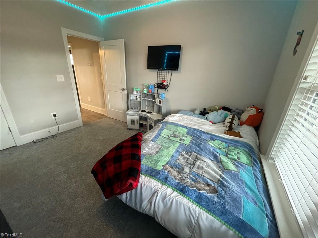 8805 Colgate Road Stokesdale, NC 27357 - Photo 14 of 34 Spacious 2nd bedroom