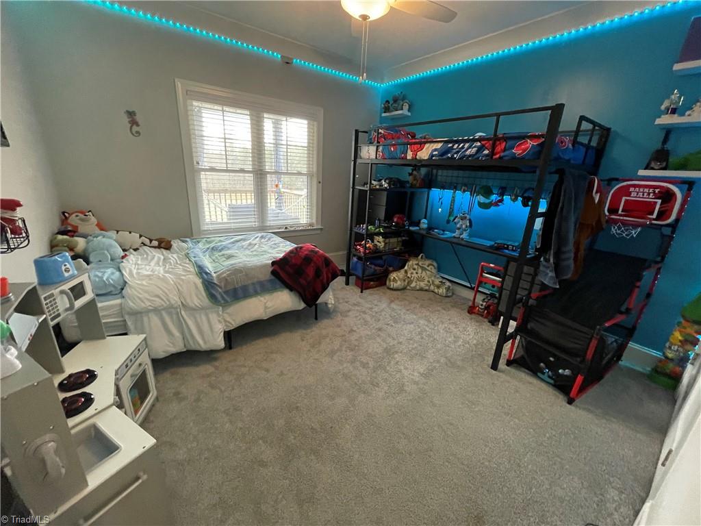 8805 Colgate Road Stokesdale, NC 27357 - Photo 15 of 34 Spacious 2nd bedroom