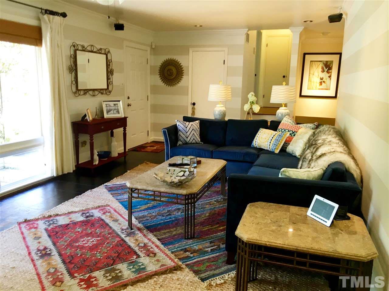 809 Currituck Drive Raleigh, NC 27609 - Photo 2 of 14 a living room with furniture and wooden floor