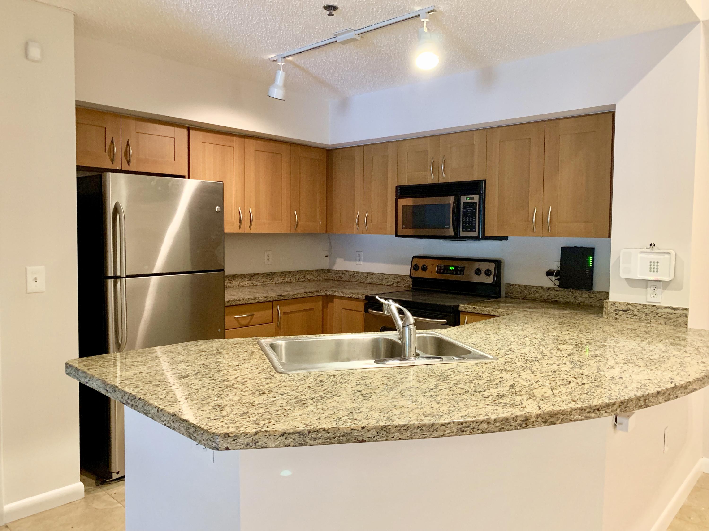 3153 Clint Moore Road, Unit 206 Boca Raton, FL 33496 - Photo 2 of 36 kitchen
