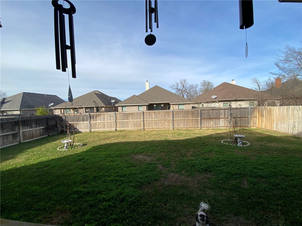 4261 Rocky Rhodes Drive College Station, TX 77845 - Photo 15 of 16 a front view of a house with garden