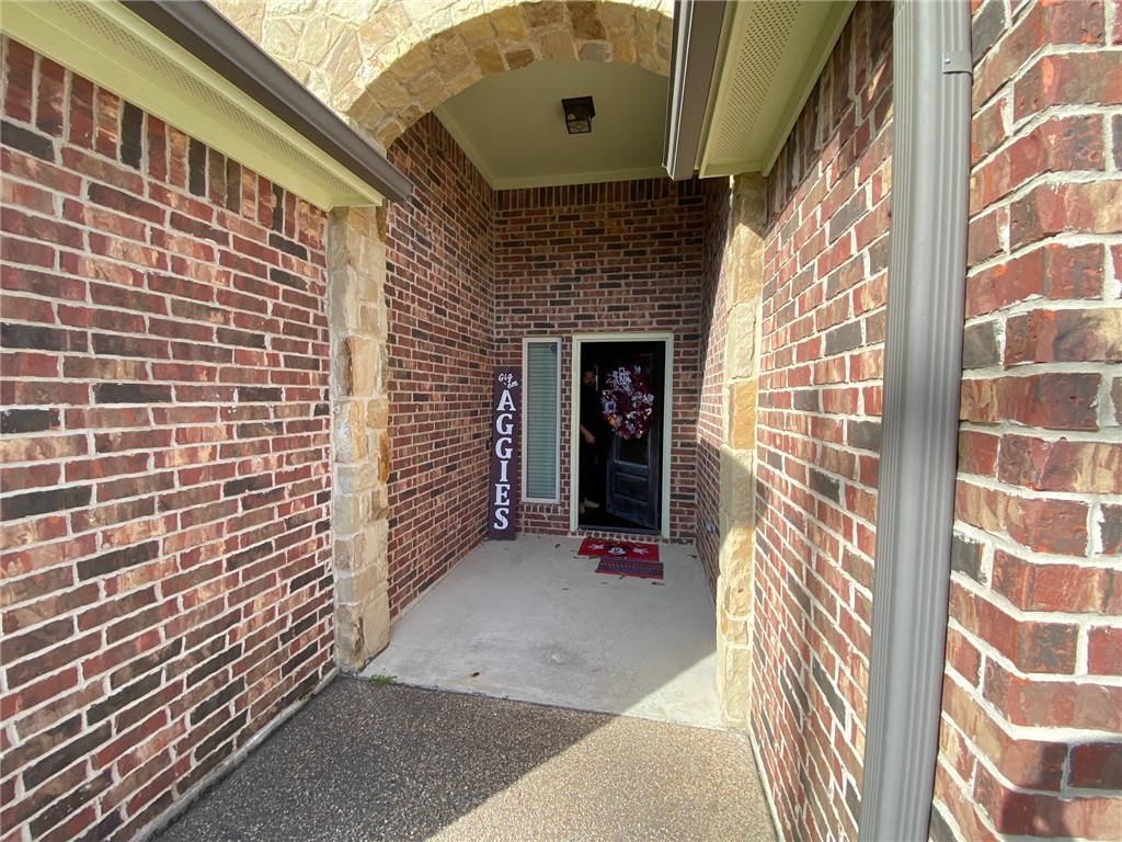 4261 Rocky Rhodes Drive College Station, TX 77845 - Photo 2 of 16 a view of entryway with brick walls