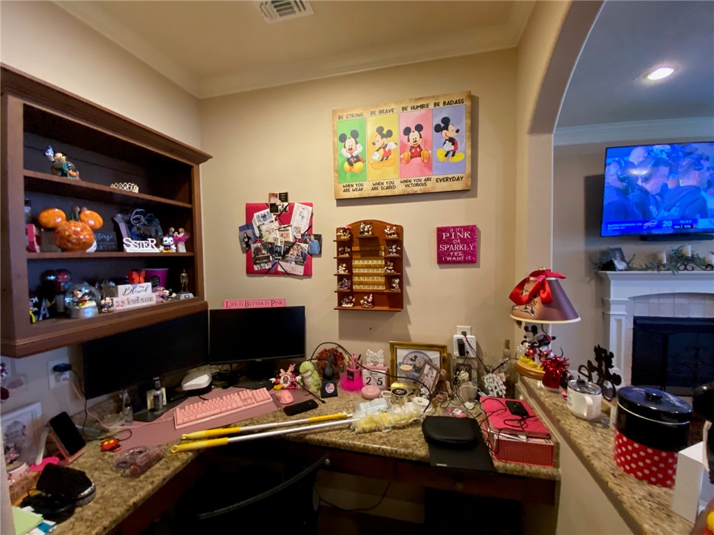 4261 Rocky Rhodes Drive College Station, TX 77845 - Photo 7 of 16 a room with furniture and a fireplace