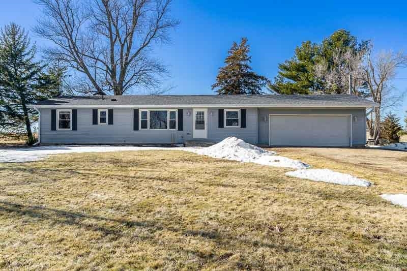 4422 North Union Road Forreston, IL 61030 - Photo 15 of 60 a front view of house with yard and trees around