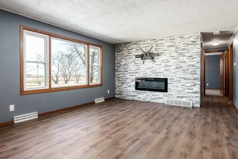 4422 North Union Road Forreston, IL 61030 - Photo 31 of 60 a view of an empty room with wooden floor and a window
