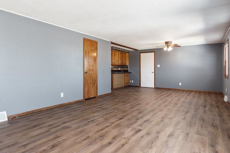 4422 North Union Road Forreston, IL 61030 - Photo 34 of 60 a view of an empty room with window and wooden floor