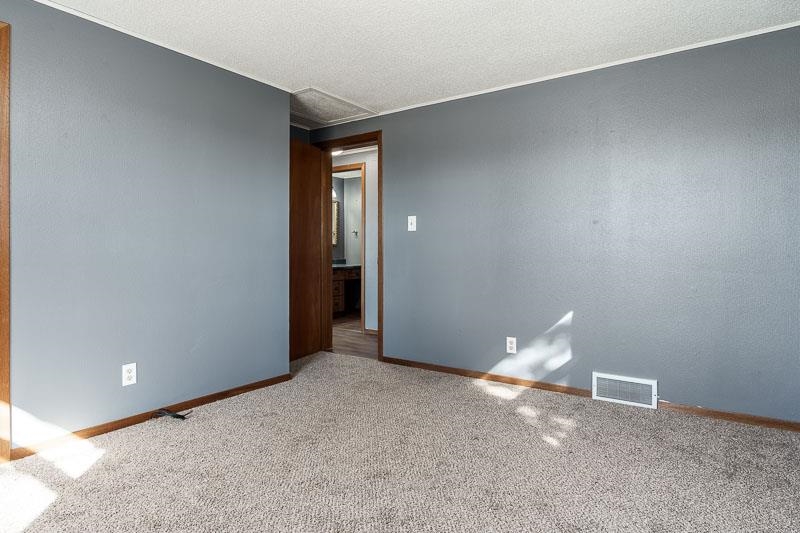 4422 North Union Road Forreston, IL 61030 - Photo 53 of 60 a view of a livingroom with an empty space and window
