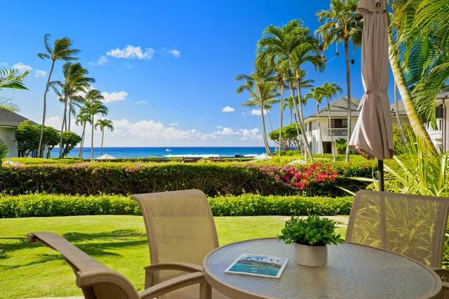 a view of a garden with an outdoor seating