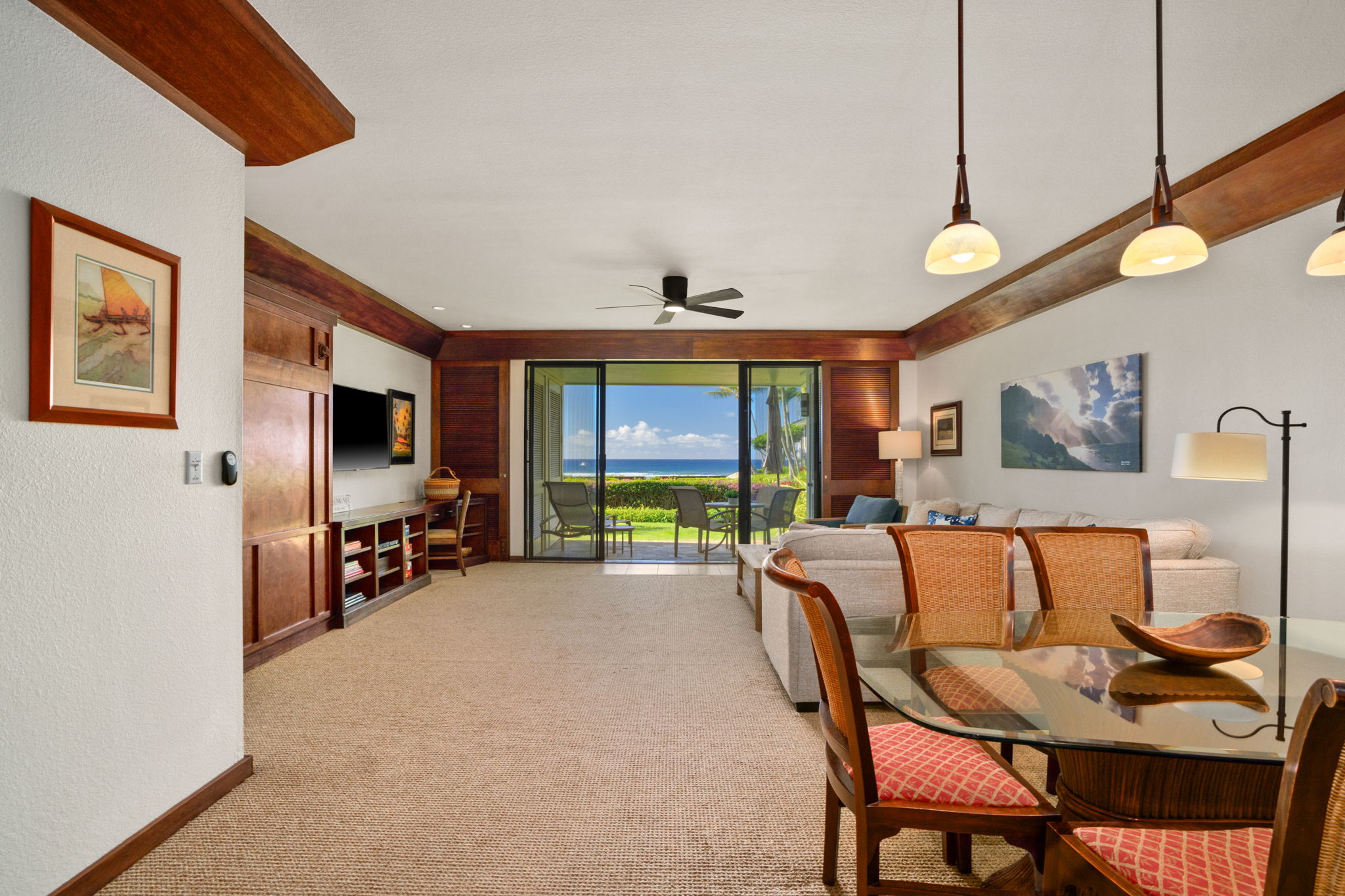2221 Kapili Road, Unit 25 Koloa, HI 96756 - Photo 2 of 6 a living room with furniture and a flat screen tv