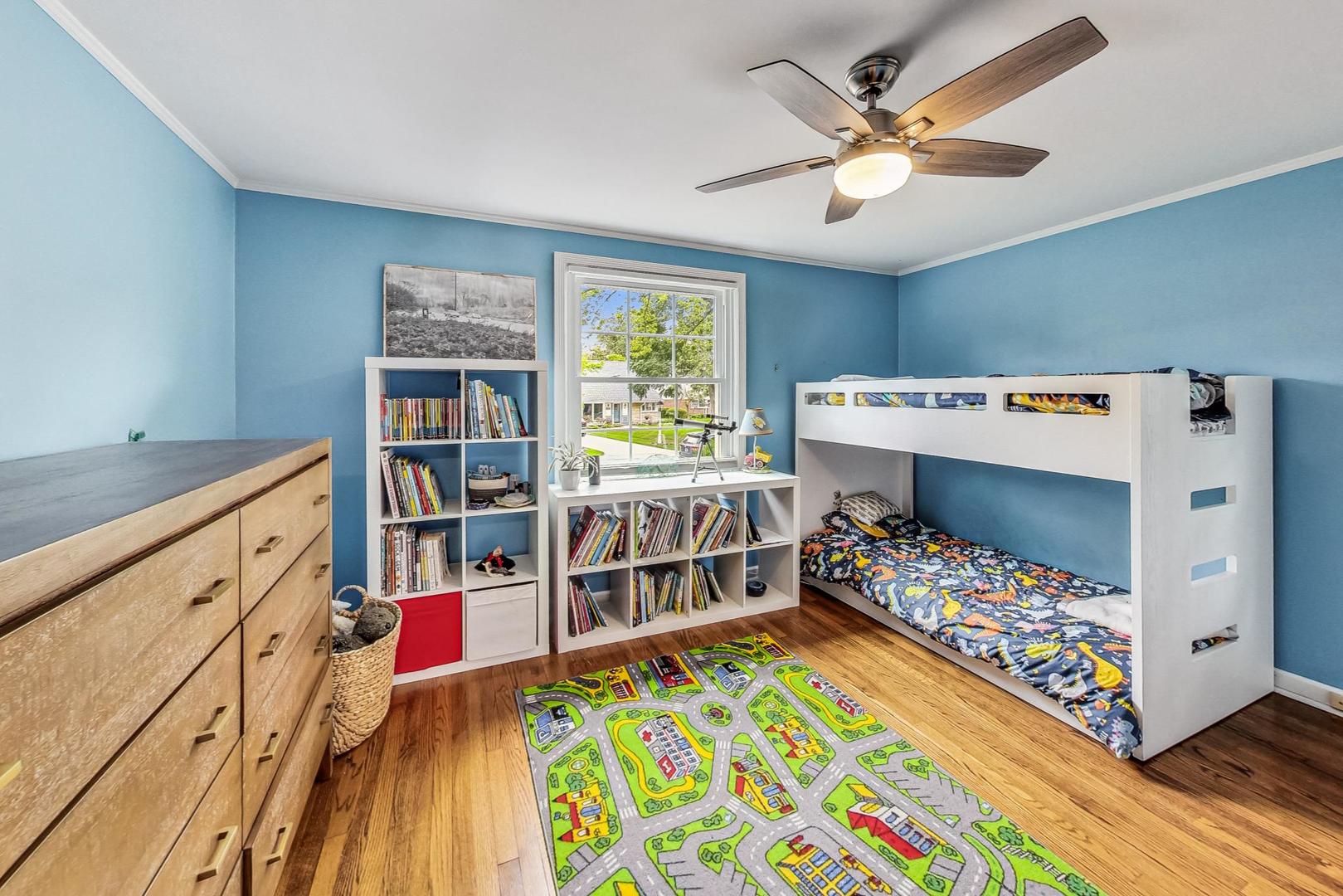 48 Williamsburg Road Evanston, IL 60203 - Photo 25 of 42 a bedroom with furniture and a baby crib
