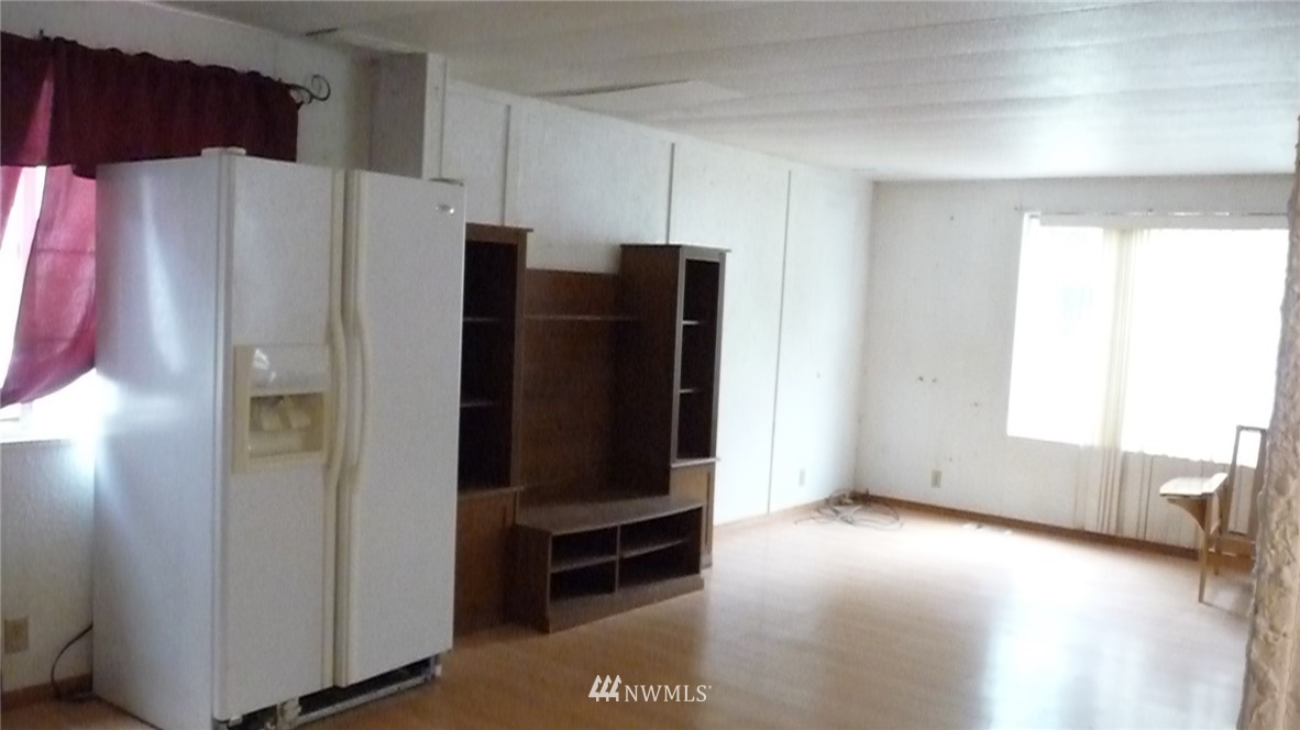 181 Head Gate Road Sequim, WA 98382 - Photo 13 of 18 a view of kitchen with refrigerator and window