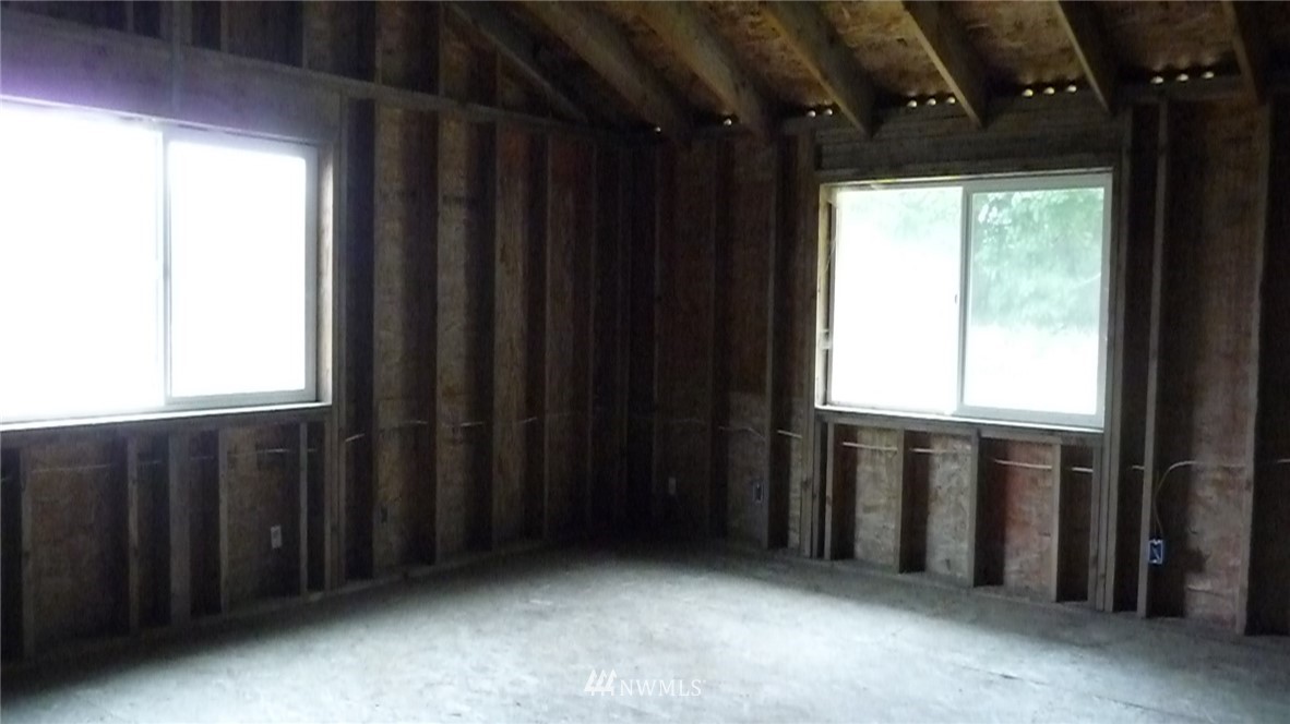 181 Head Gate Road Sequim, WA 98382 - Photo 17 of 18 a view of an empty room with a window