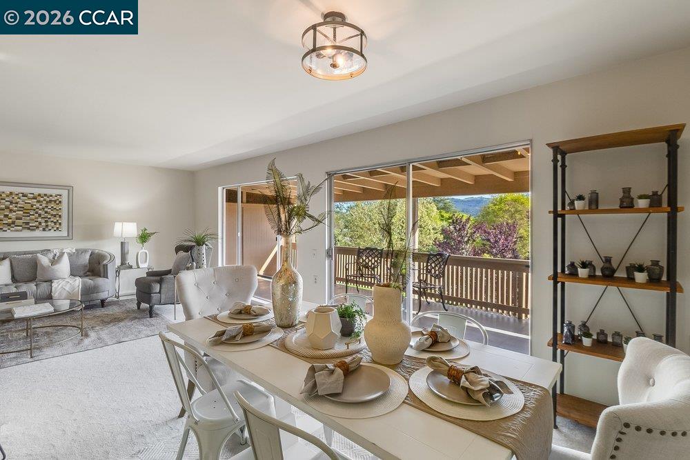 2801 Golden Rain Road, Unit 3 Walnut Creek, CA 94595 - Photo 13 of 29 a living room with furniture and a large window