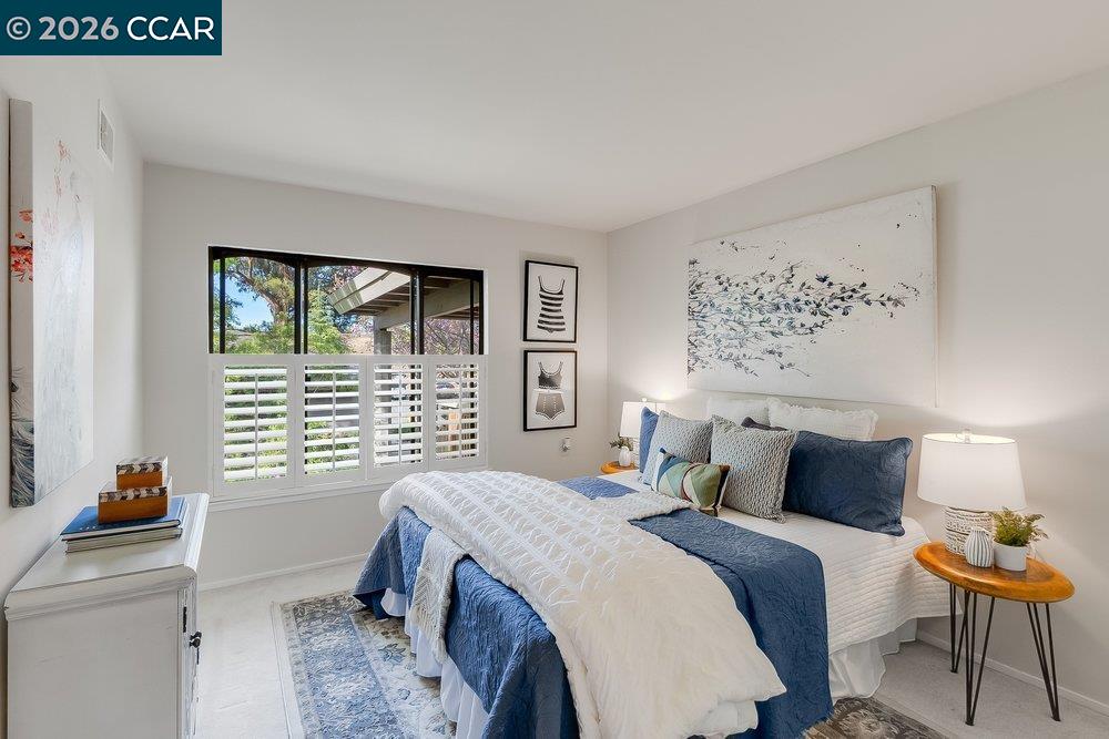 2801 Golden Rain Road, Unit 3 Walnut Creek, CA 94595 - Photo 18 of 29 a bedroom with a bed and a window