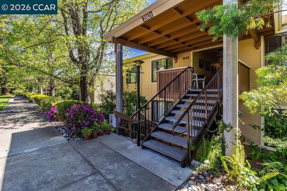 2801 Golden Rain Road, Unit 3 Walnut Creek, CA 94595 - Photo 4 of 29 a view of stairs and flowers