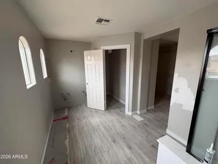 a view of empty room with windows