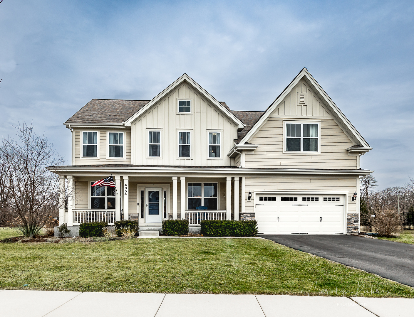 4354 Rudyard Kipling Road Elgin, IL 60124 - Photo 1 of 23 a front view of a house with a yard