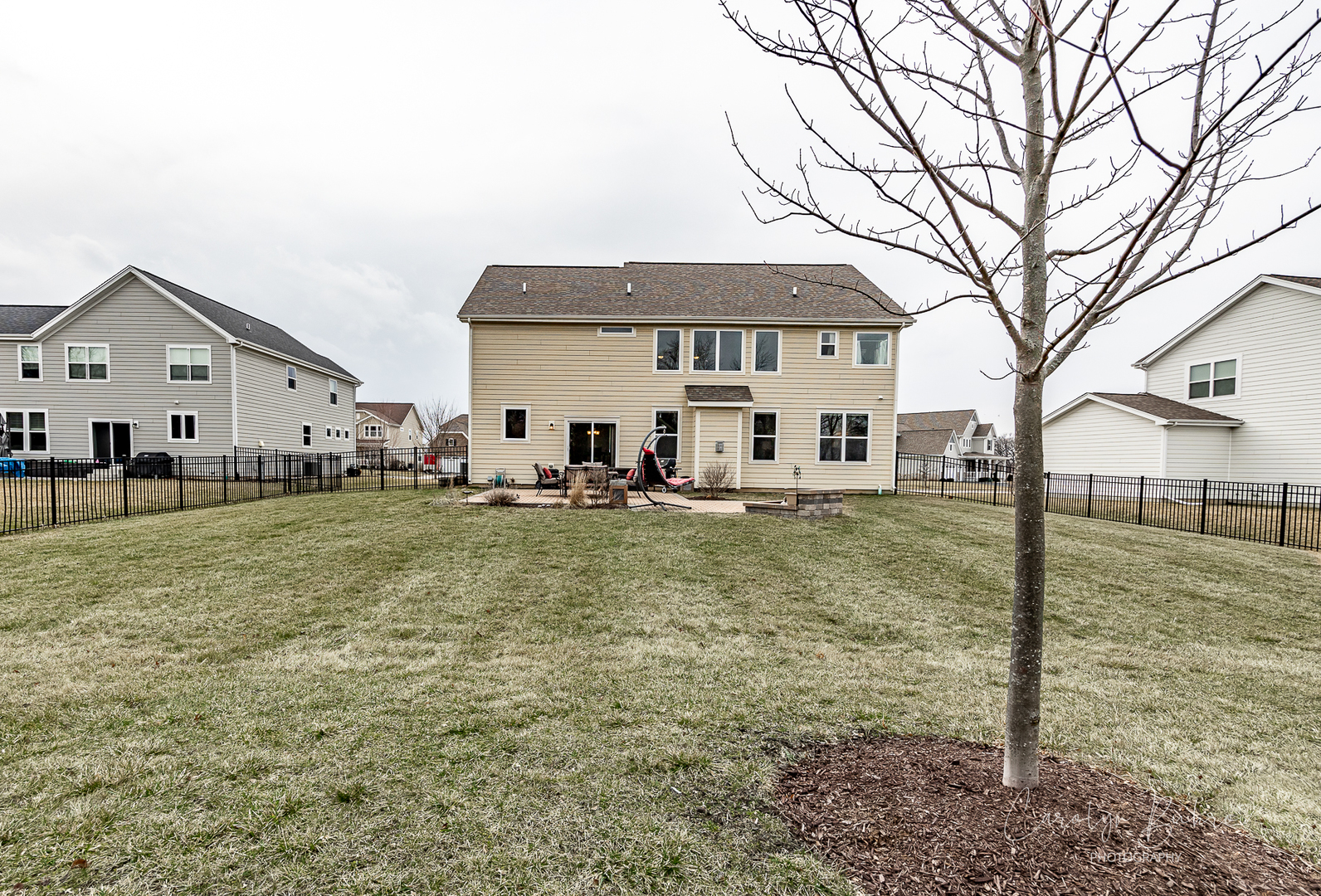4354 Rudyard Kipling Road Elgin, IL 60124 - Photo 22 of 23 a front view of a house with a yard