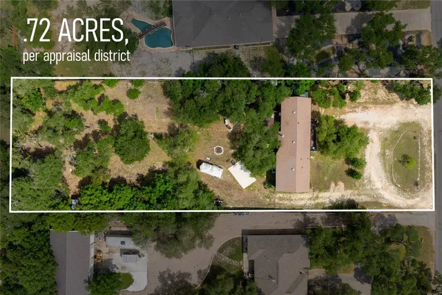 a view of a balcony with chair and wooden floor