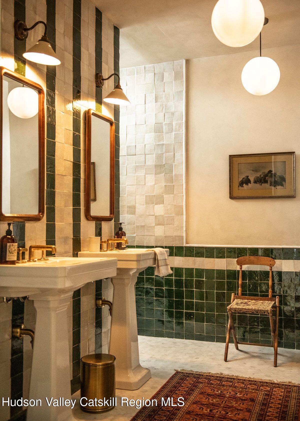 1174 Potter Mountain Road Gilboa, NY 12076 - Photo 23 of 33 a bathroom with a sink and a mirror