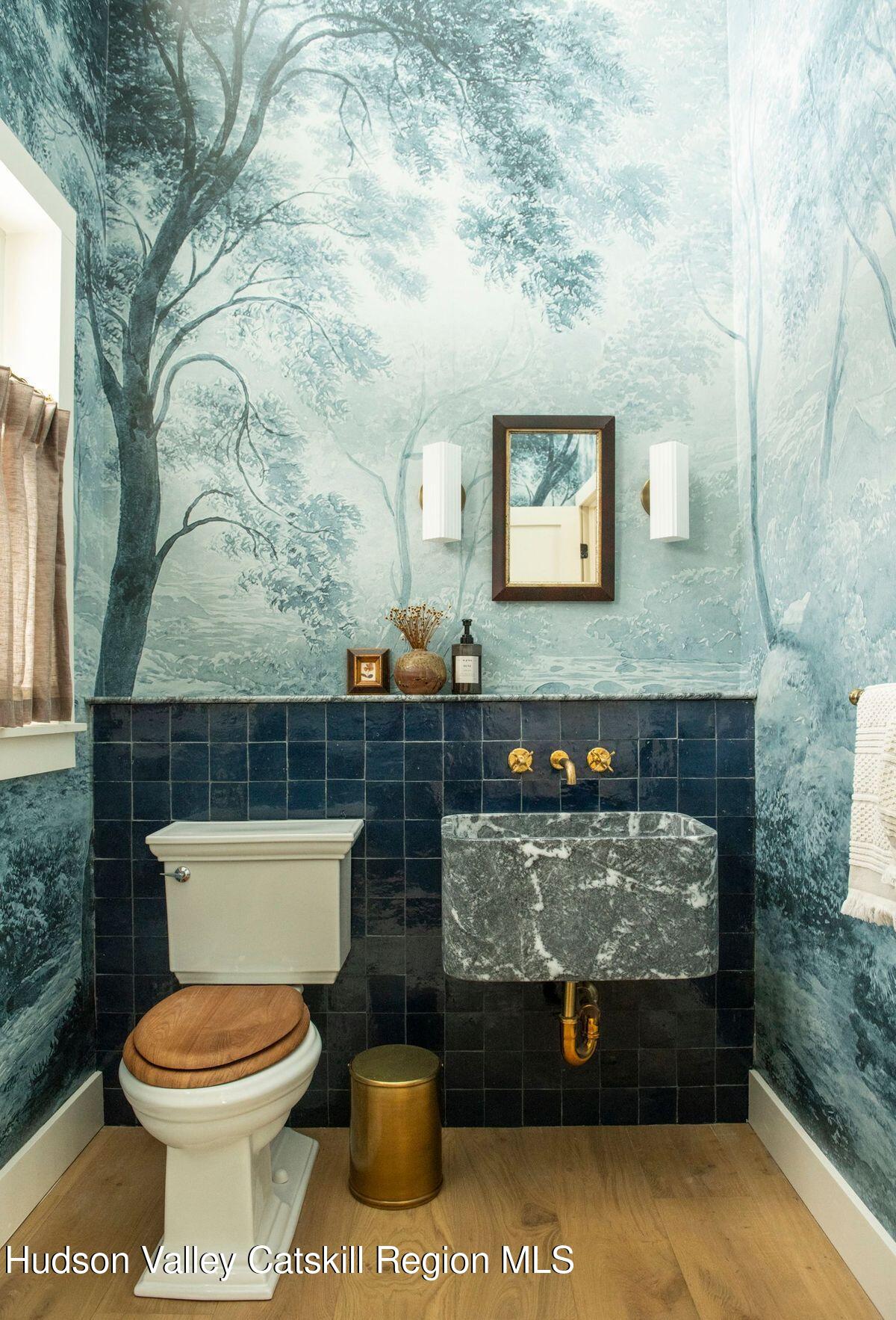 1174 Potter Mountain Road Gilboa, NY 12076 - Photo 25 of 33 a bathroom with a toilet and a sink