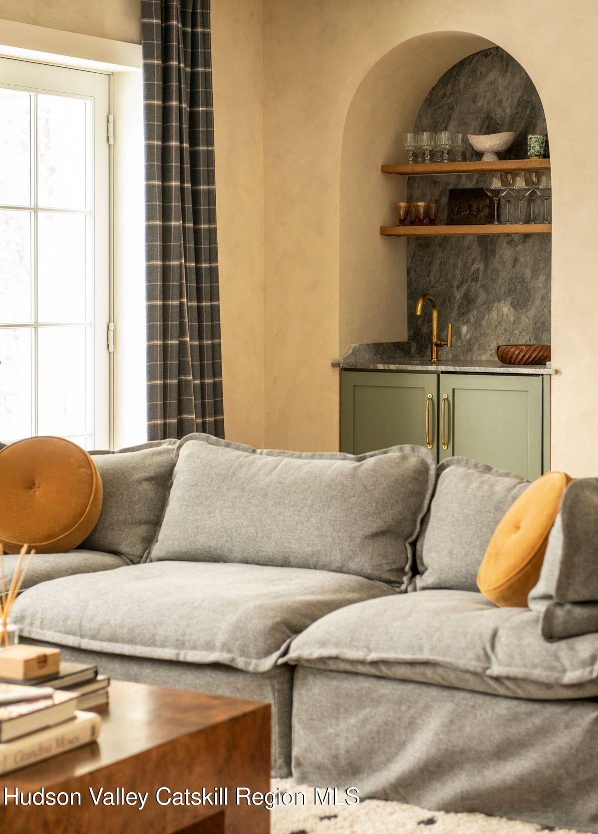 1174 Potter Mountain Road Gilboa, NY 12076 - Photo 27 of 33 a living room with a couch