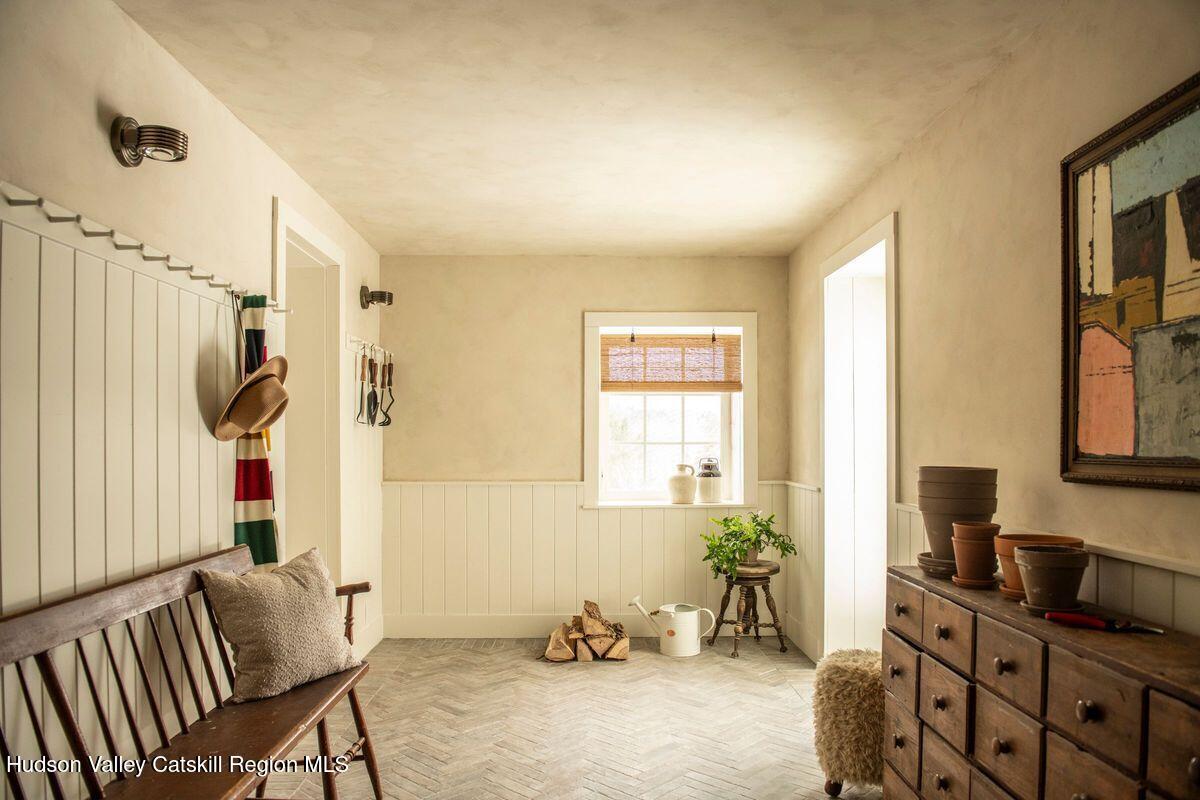 1174 Potter Mountain Road Gilboa, NY 12076 - Photo 30 of 33 a bedroom with furniture and a window