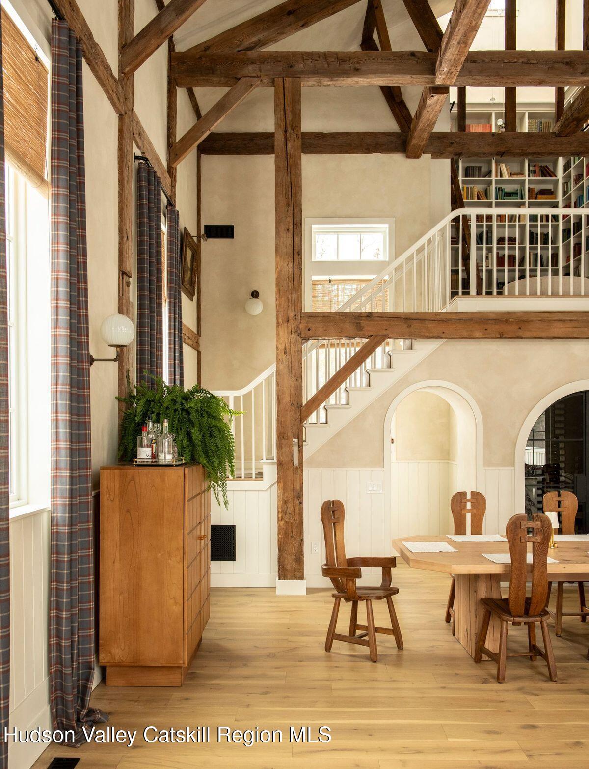 1174 Potter Mountain Road Gilboa, NY 12076 - Photo 5 of 33 a view of a patio with couches table and chairs and potted plants
