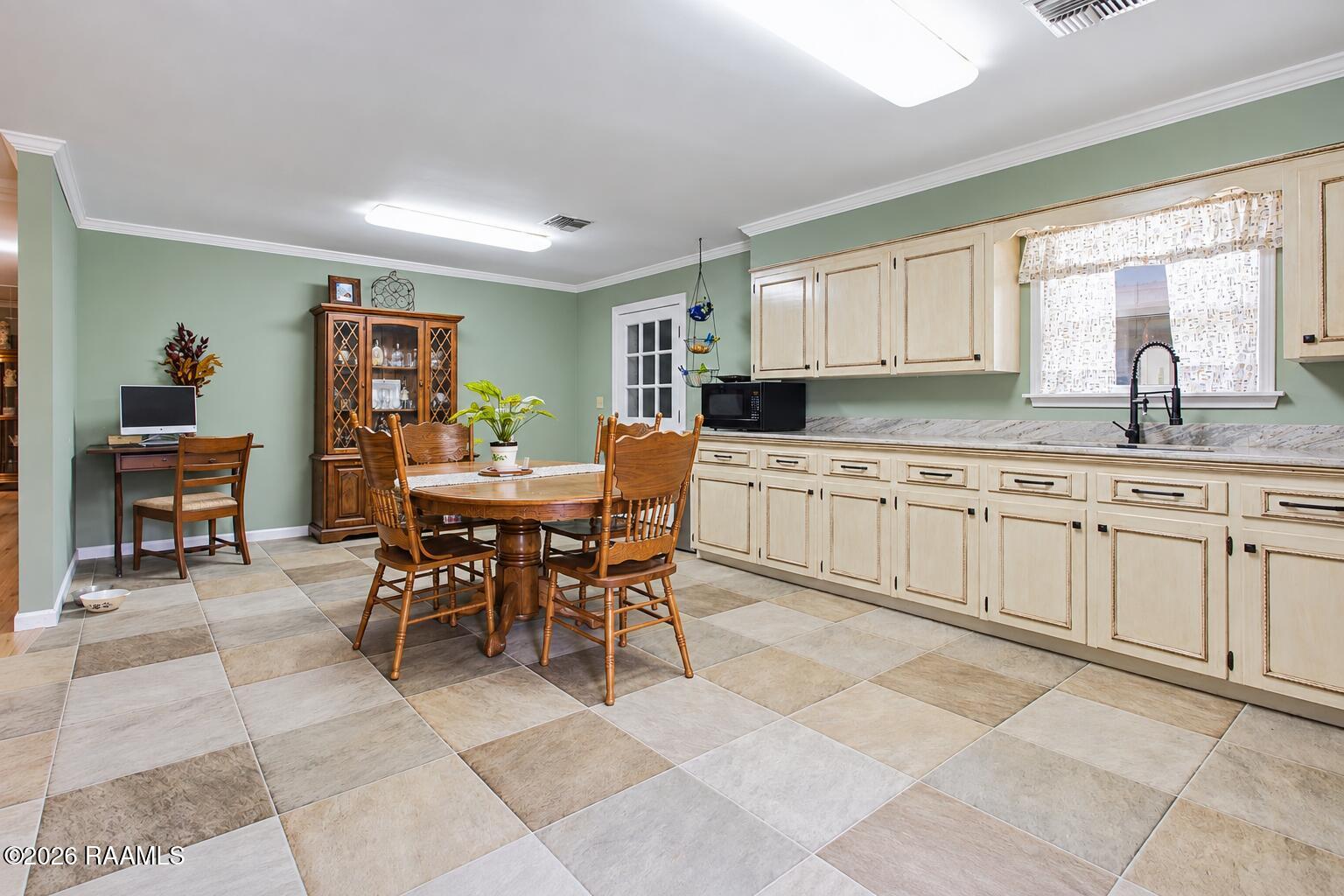 2685 Lloyd Road Maurice, LA 70555 - Photo 7 of 19 Bright Sage-Green Kitchen Dining Room