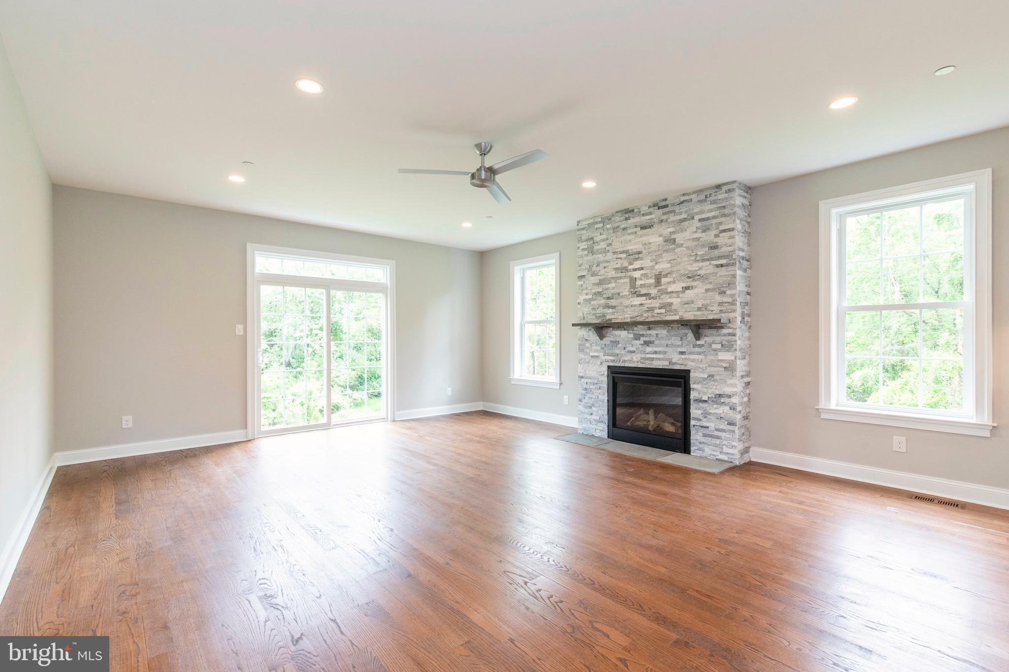 3537 Caley Road Newtown Square, PA 19073 - Photo 9 of 36 Family Room with Fireplace & Slider to Deck