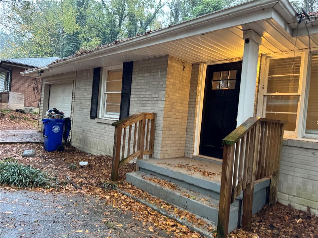 3137 McAfee Road Decatur, GA 30032 - Photo 1 of 1 a front view of a house with parking space