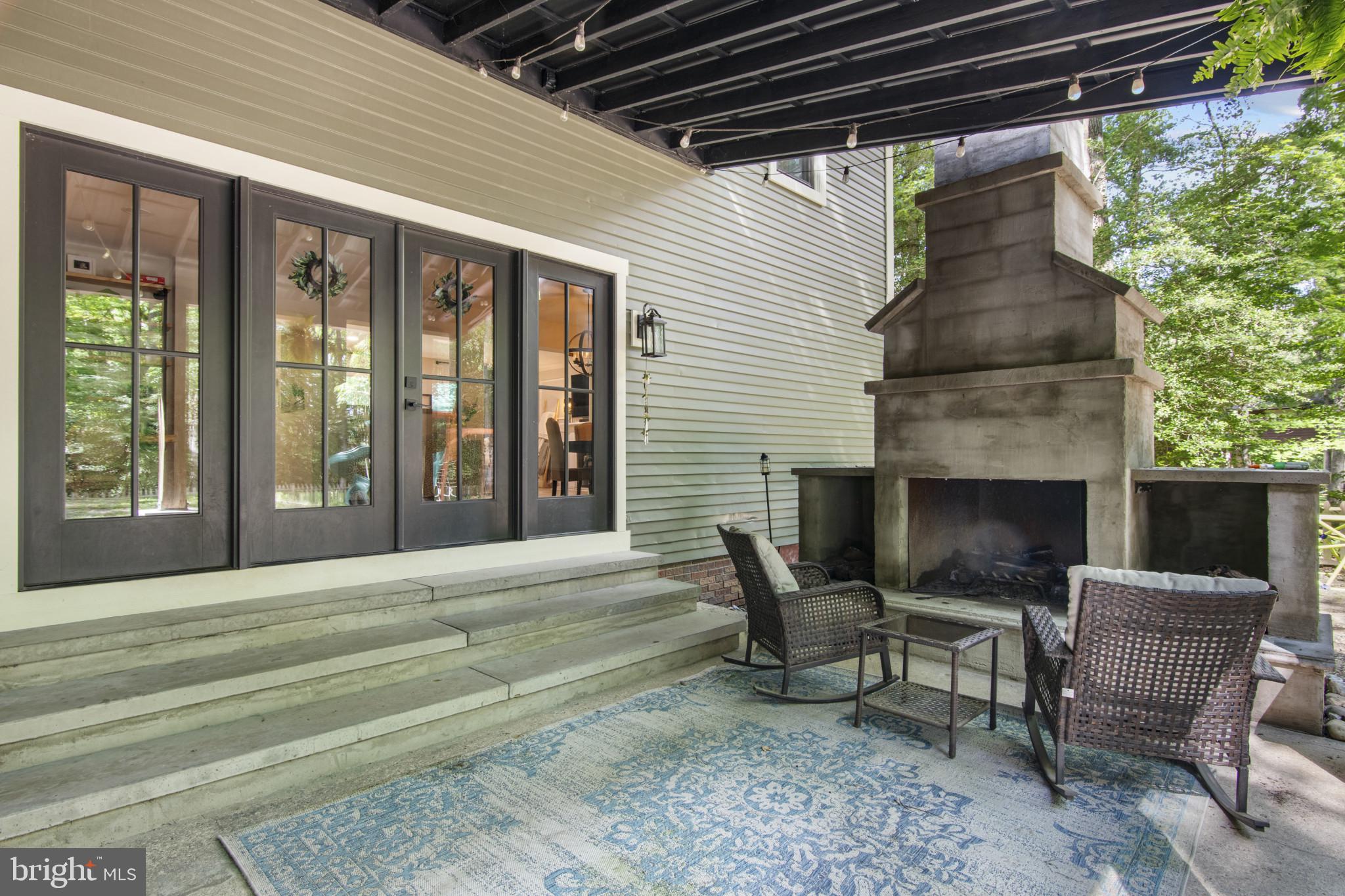 3965 Featherstone Drive Salisbury, MD 21804 - Photo 36 of 43 Rear Patio with Fireplace