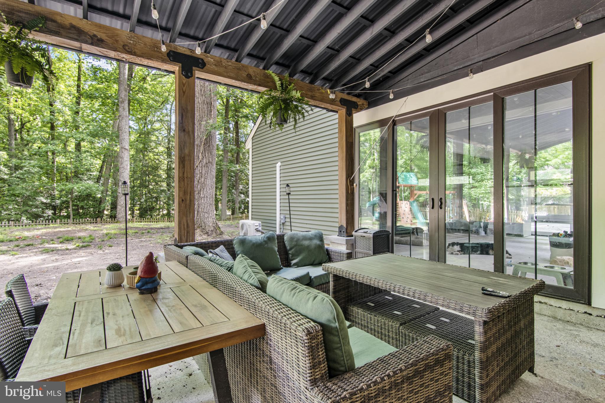 3965 Featherstone Drive Salisbury, MD 21804 - Photo 37 of 43 Rear Patio with Fireplace