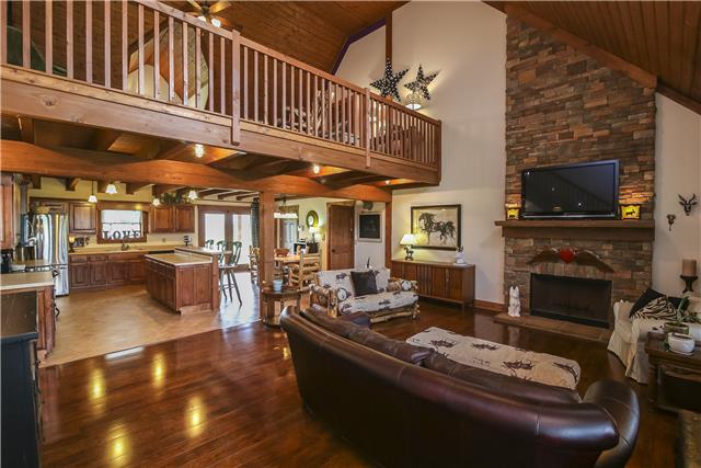 4360 North Pinson Road Portland, TN 37148 - Photo 20 of 20 Two story living room has beautiful hardwood floors, floor to ceiling stone fireplace (wood burning) and great open floor plan.