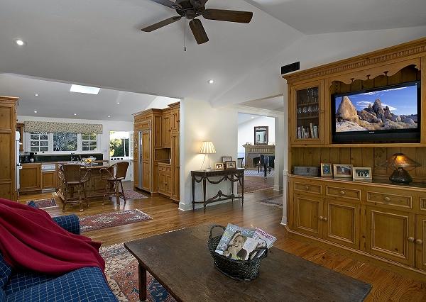 1379 School House Road Montecito, CA 93108 - Photo 3 of 11 a living room with furniture a rug and kitchen view