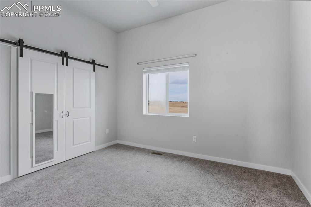 16750 Rabbit Track Trail Colorado Springs, CO 80930 - Photo 22 of 50 Bedroom #2 on the Main Level.