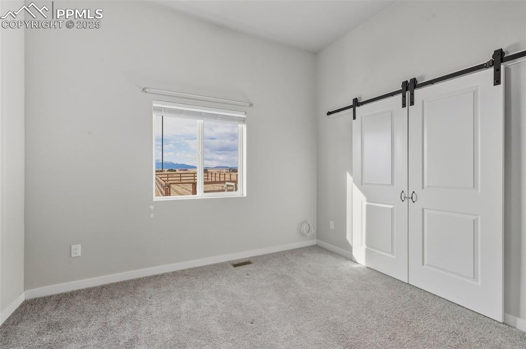 16750 Rabbit Track Trail Colorado Springs, CO 80930 - Photo 25 of 50 Bedroom #3 on the Main level.