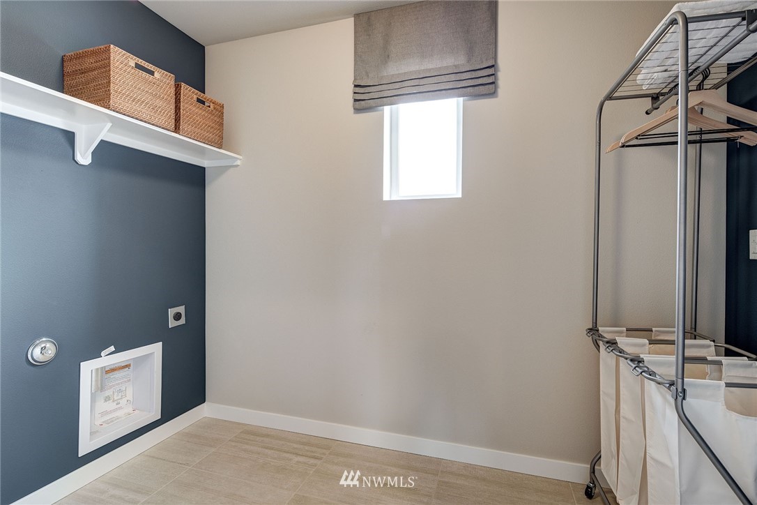 118 215th Street Southeast, Unit 8 Bothell, WA 98021 - Photo 17 of 21 a view of a storage & utility room with a window