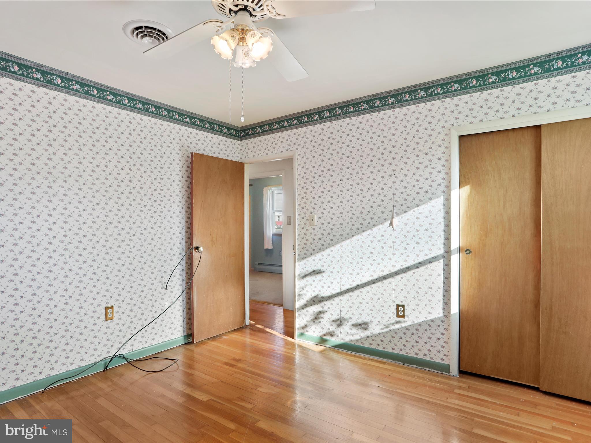 60 Grey Spring Avenue Bunker Hill, WV 25413 - Photo 19 of 35 a view of a livingroom with wooden floor