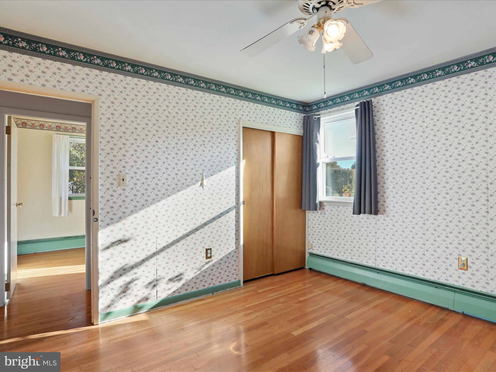 60 Grey Spring Avenue Bunker Hill, WV 25413 - Photo 20 of 35 a view of a livingroom with an empty space