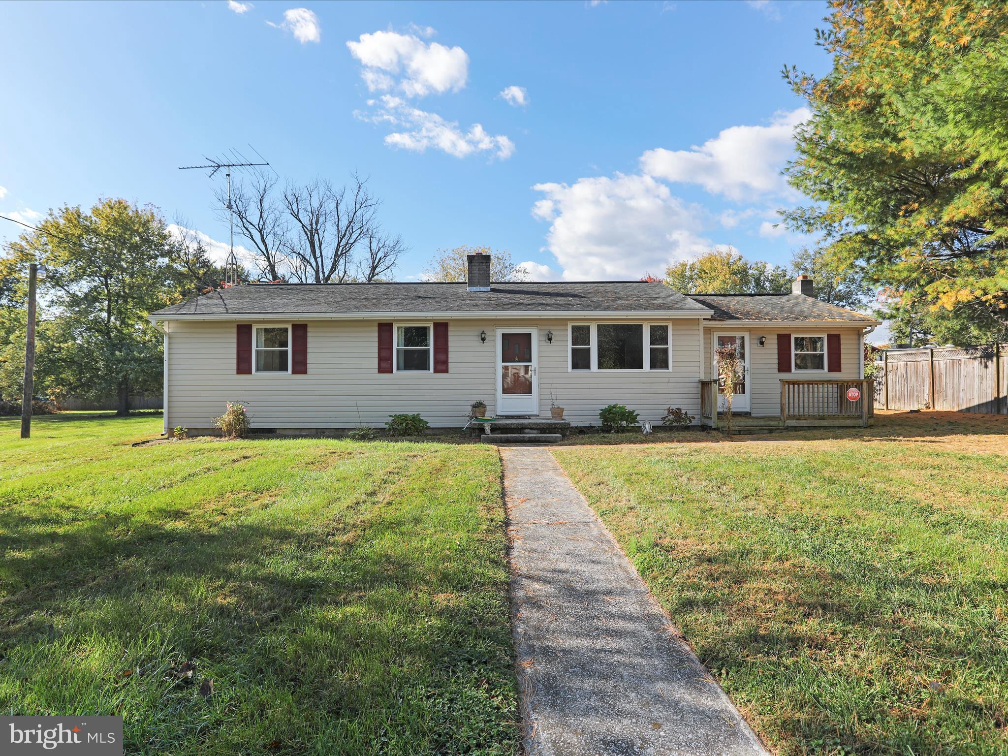 60 Grey Spring Avenue Bunker Hill, WV 25413 - Photo 3 of 35 a view of a house with a backyard