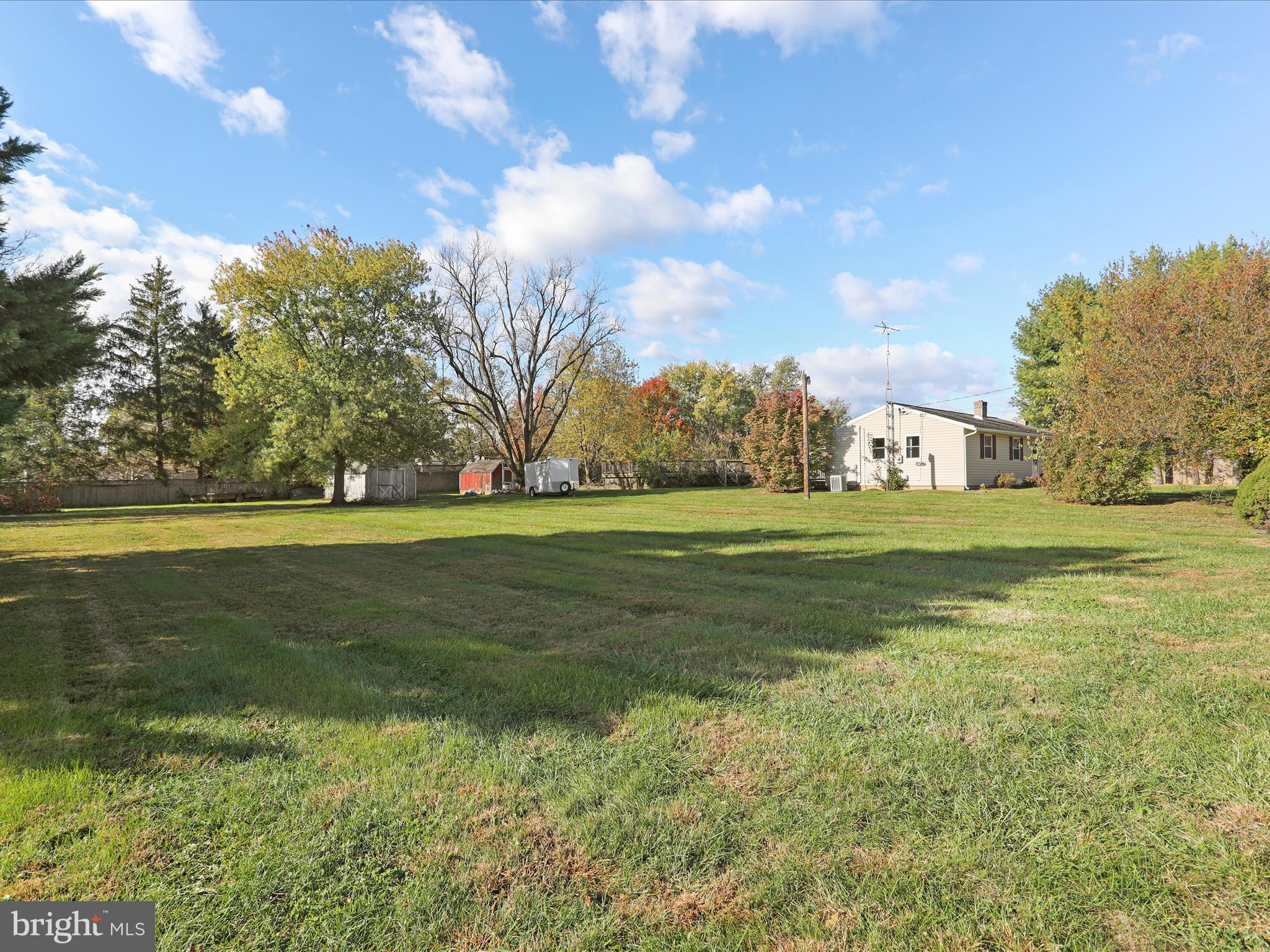 60 Grey Spring Avenue Bunker Hill, WV 25413 - Photo 34 of 35 a view of a field with an trees
