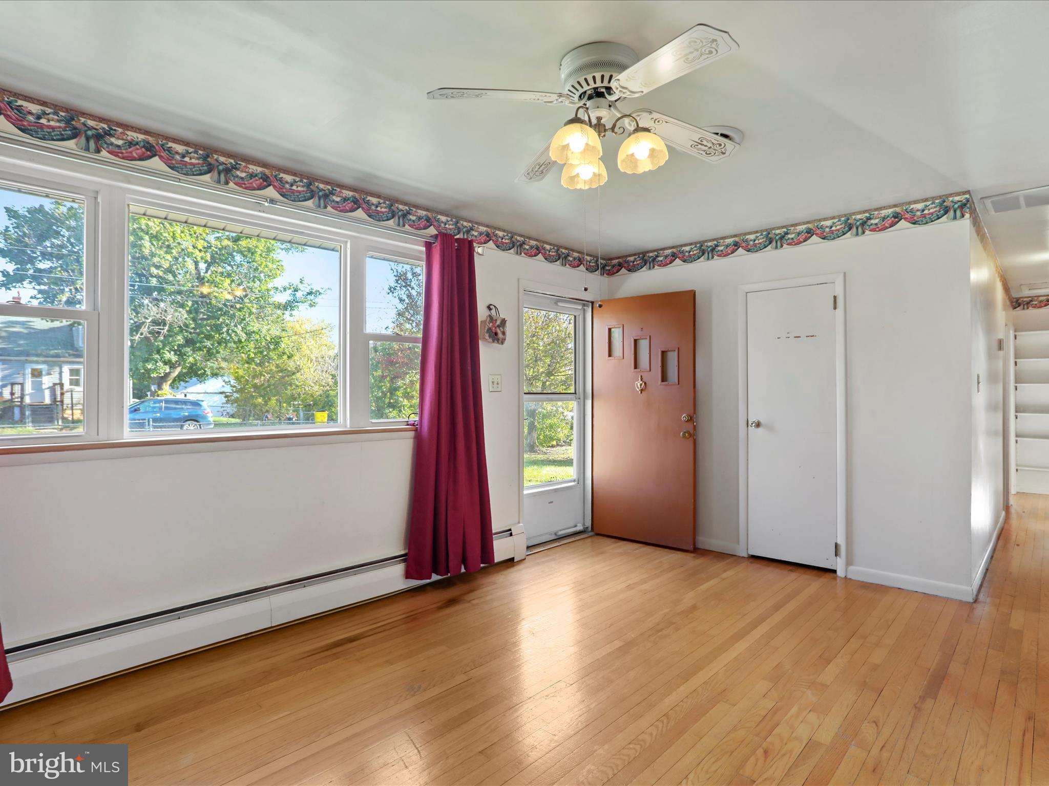 60 Grey Spring Avenue Bunker Hill, WV 25413 - Photo 6 of 35 a view of an empty room with a window