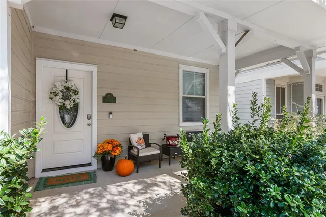 front view of a house with a backyard