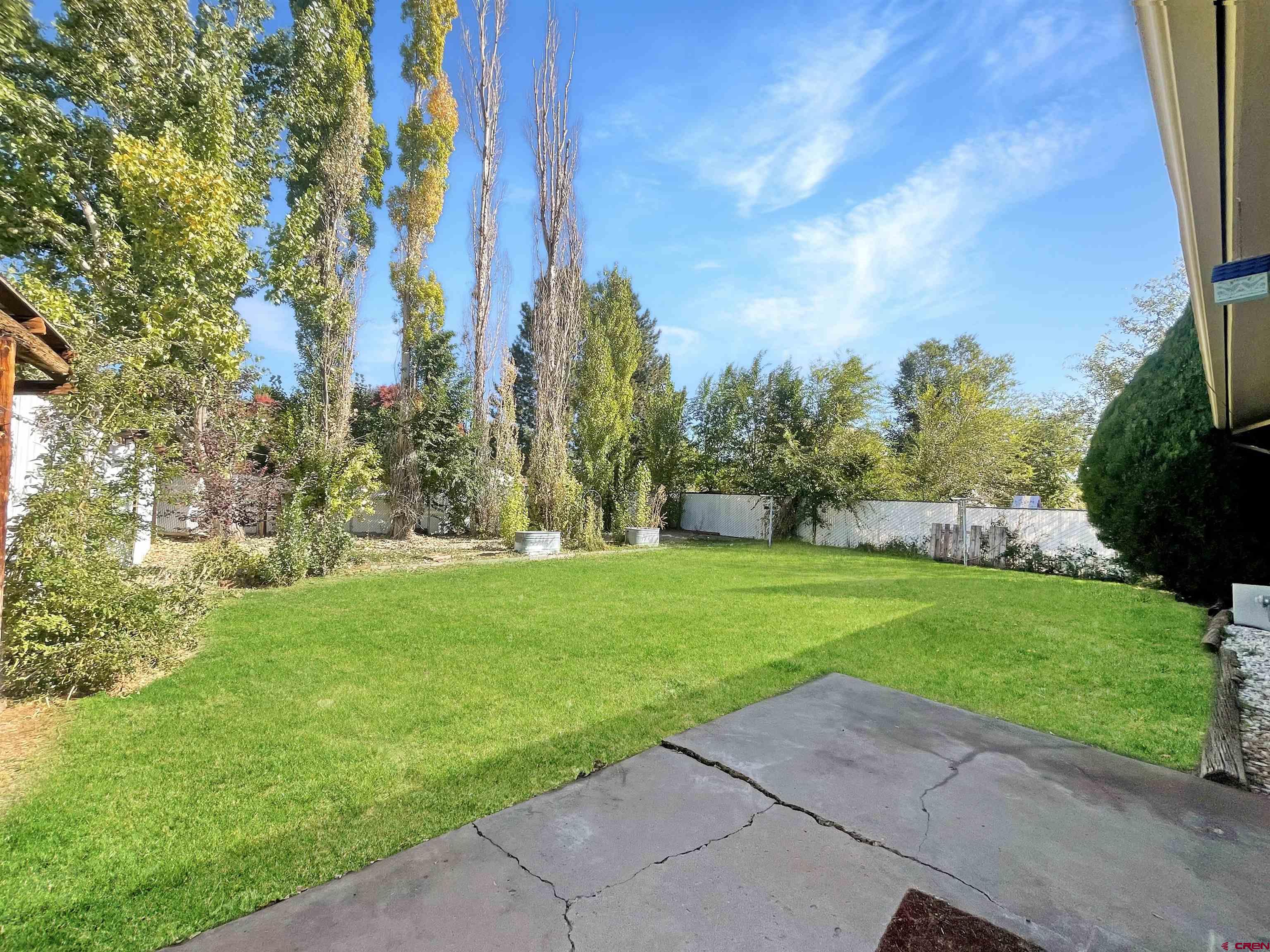 16 West 10th Street Cortez, CO 81321 - Photo 18 of 18 a view of a park with large trees