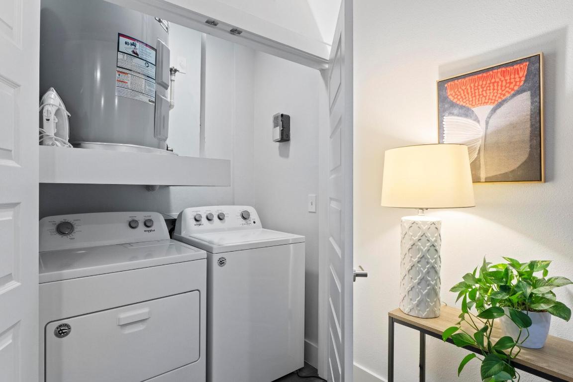 2213 Poquito Street, Unit 319 Austin, TX 78722 - Photo 21 of 22 a utility room with dryer and washer