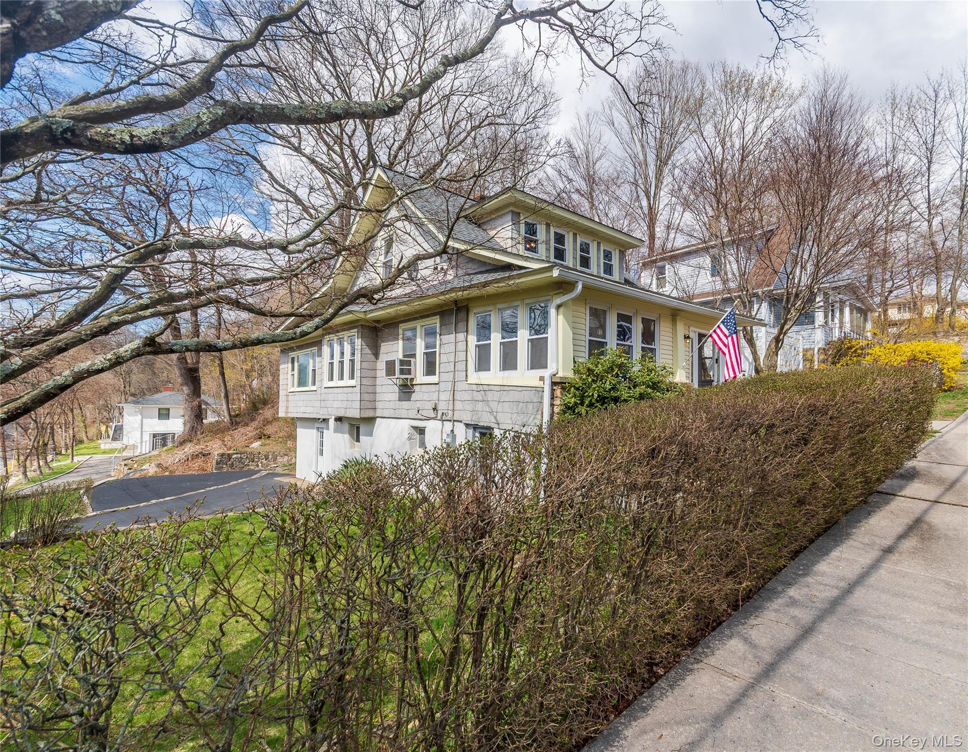 200 Husted Avenue Peekskill, NY 10566 - Photo 3 of 50 a front view of a house with a garden