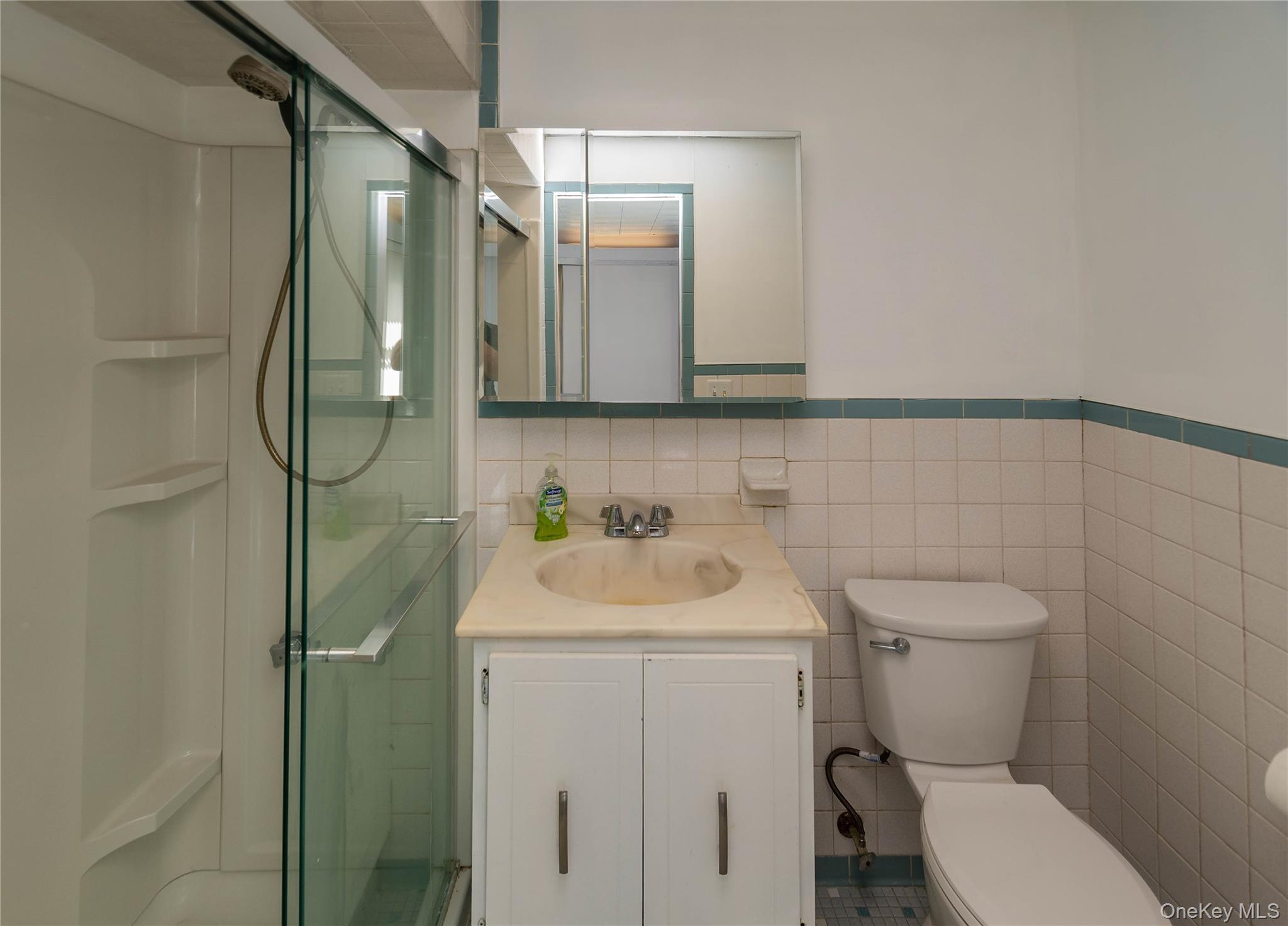 200 Husted Avenue Peekskill, NY 10566 - Photo 33 of 50 a bathroom with a sink a toilet and shower