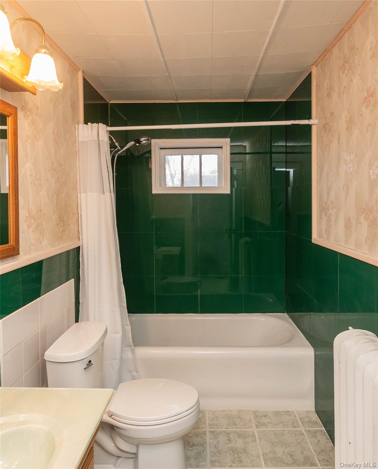 200 Husted Avenue Peekskill, NY 10566 - Photo 40 of 50 a bathroom with a toilet a sink and bathtub