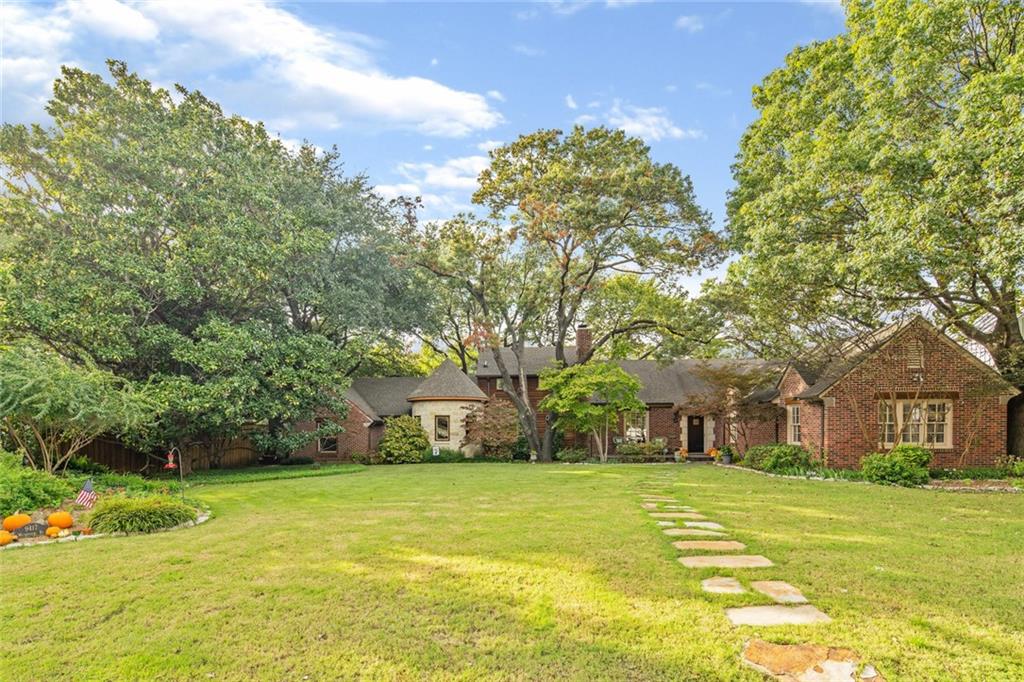 9417 Waterview Road Dallas, TX 75218 - Photo 1 of 1 a view of a house with a yard